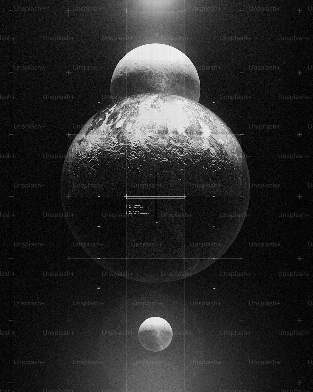 a black and white photo of two planets