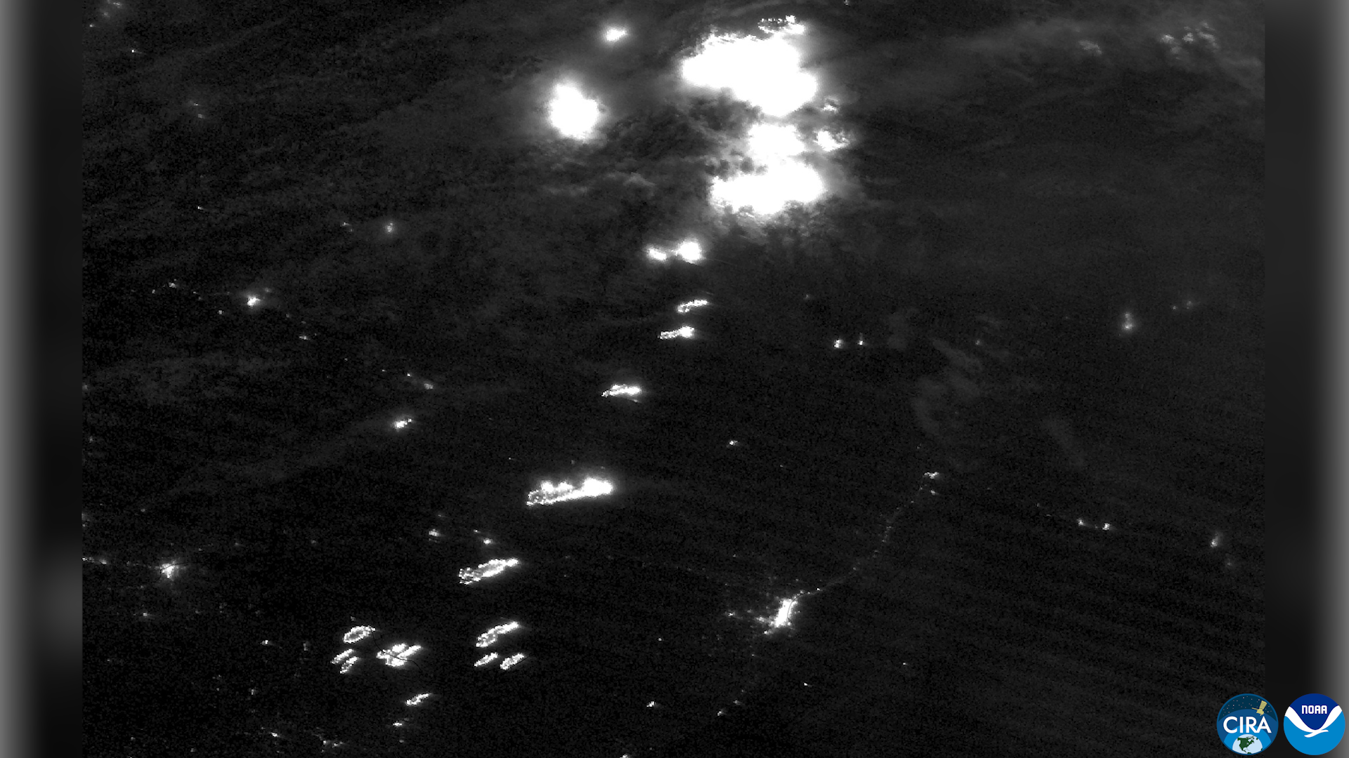 CIRA NOAA-20 night satellite image showing Ontario fires burning as orange hotspots, July 14 2026