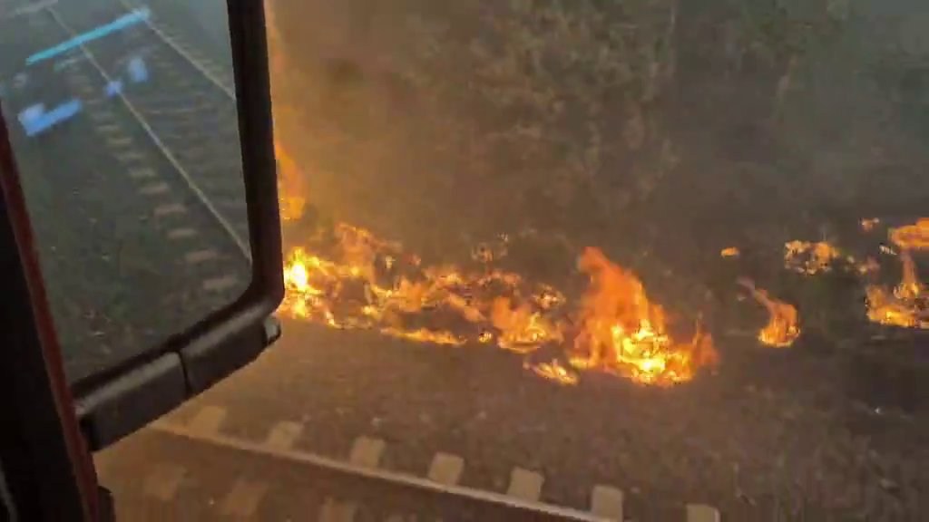CN freight train surrounded by wildfire near Armstrong, Ontario, July 15 2026